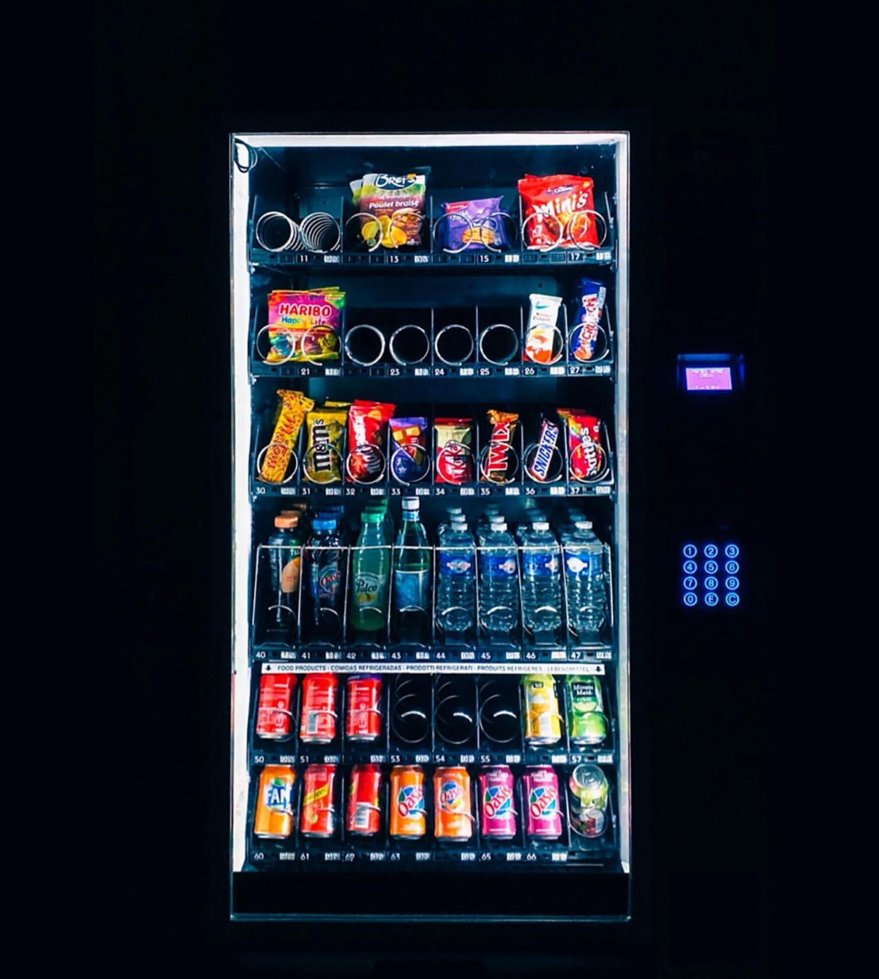 Advanced vending machine in an Irish urban setting, showcasing modern design and digital interface